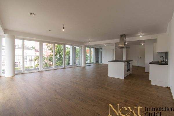 Musterfoto Wohn-, Ess- und Kochbereich