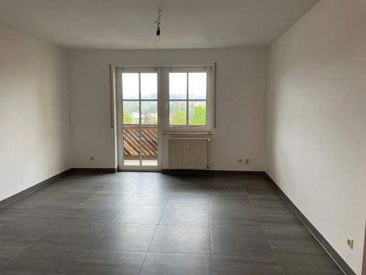 Wohnzimmer mit Balkon