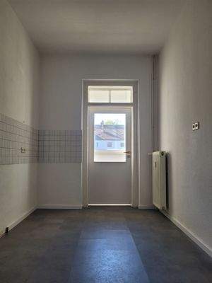 Küche mit Zugang zum Wintergarten