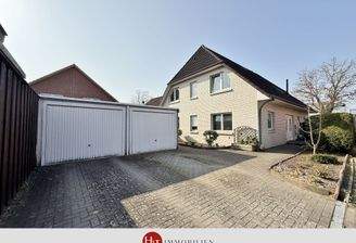 H&T Immobilien - Zweifamilienhaus in Stuhr