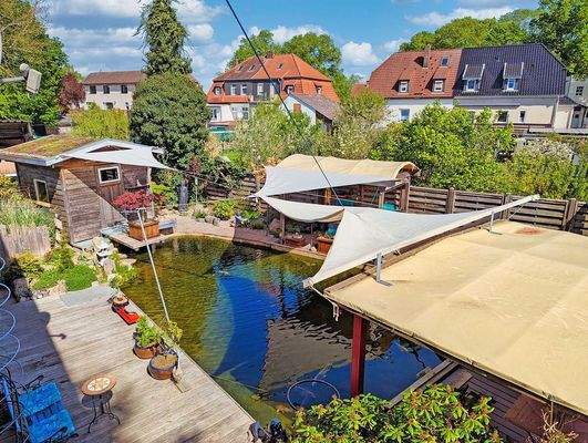 makellos 26 EFH Bützow  - Koiteich mit Terrasse.jp