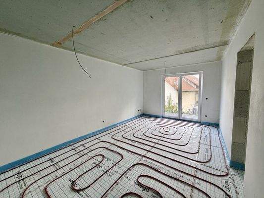 Wohn- und Esszimmer mit offener Küche