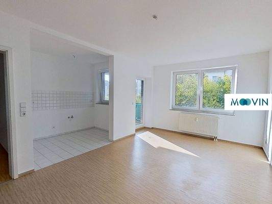 Ansicht I: Wohn- und Esszimmer mit offenem Küchenbereich