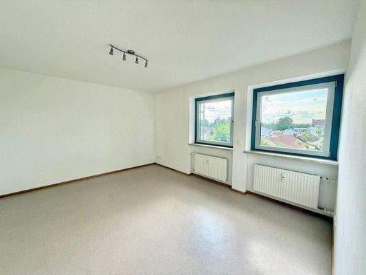 Freundlicher Schlafbereich vor Renovierung