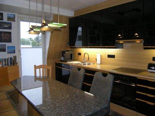 Wohnküche mit Balkon