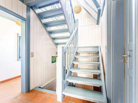 Treppe in das Obergeschoss