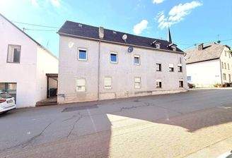 Mehrfamilienhaus mit 4 Wohneinheiten großem Garten