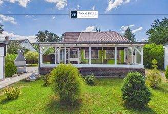 Sonniges Baugrundstück mit Bestandsbungalow