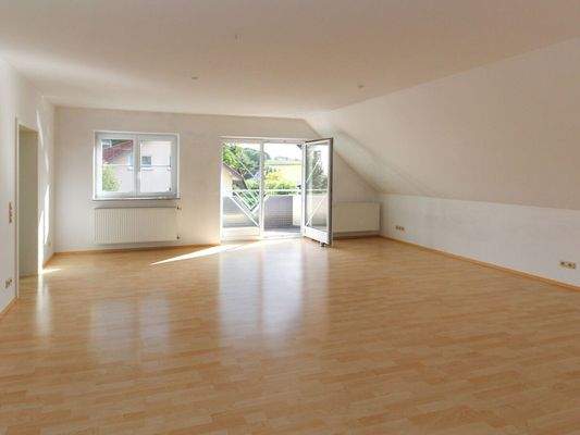 Wohnbereich mit Balkonzugang 