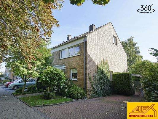 Haushälfte mit Garage und Garten