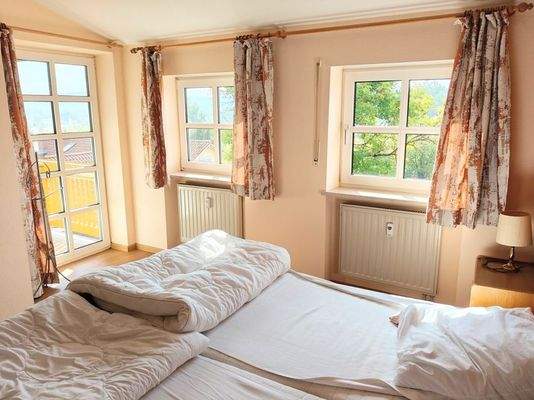 Schlafen mit Zugang zum Balkon