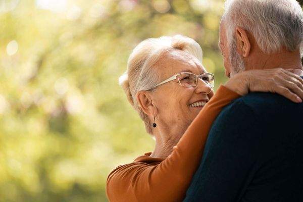 close-up-senior-couple-holding-each-other.jpg
