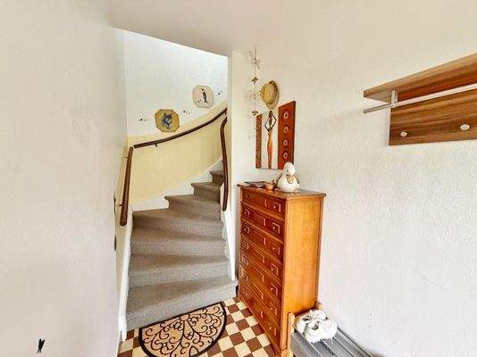 Windfang mit Zugang zur OG-Wohnung