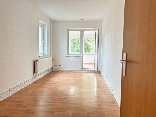 Das Wohnzimmer mit Wintergarten