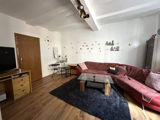 17 wohnzimmer-1.-og-we-1-mehrfamilienhaus-duderstadt-rkm-immobilienkontor.jpg