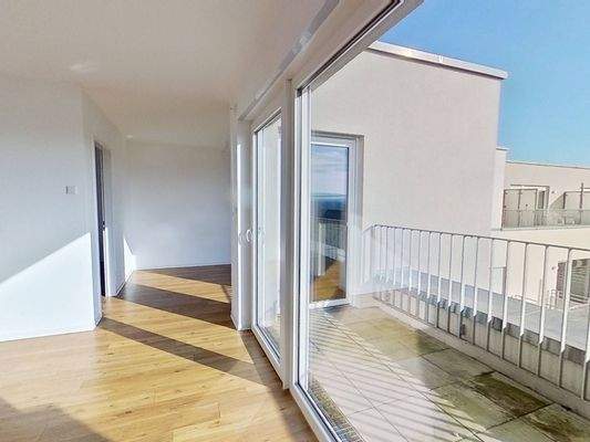 Ansicht IV: Wohn- und Esszimmer mit offenem Küchenbereich