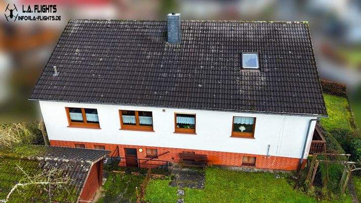 Eingang zum Kellergeschoss und Garten