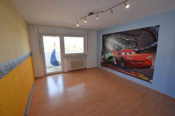 Schlafzimmer mit Balkonausgang