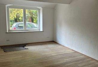 Büro mit Holzfußboden