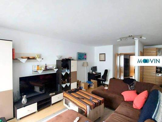 Ansicht I: Wohn- und Esszimmer mit offenem Küchenbereich