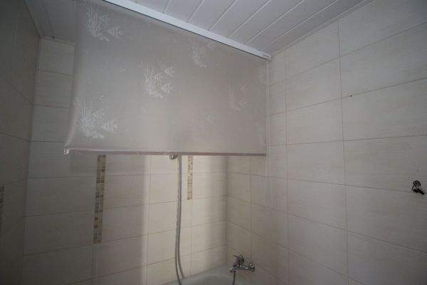 Duschrollo bei Badewanne