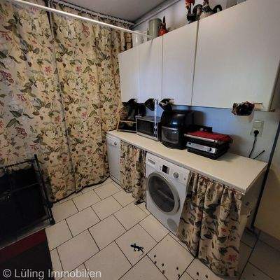 Abstellraum mit Waschmaschine