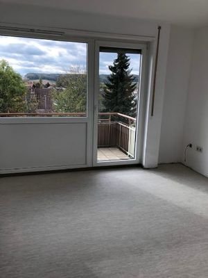 Wohnzimmer mit Balkon