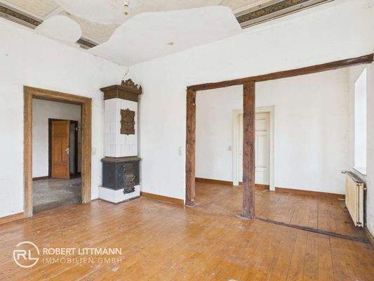 Schlafzimmer 1 + Kachelofen