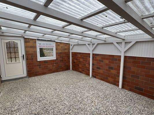 Geschlossene und überdachte Terrasse