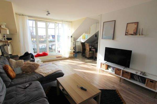 Wohnzimmer mit Zugang Balkon