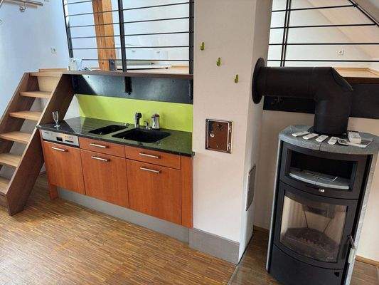 Küche mit Kaminofen