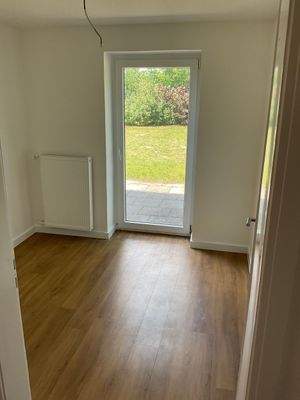 Zimmer mit Gartenzugang