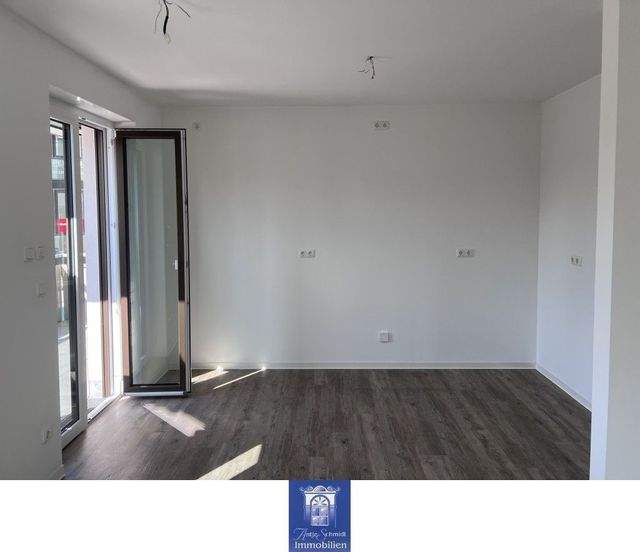 Modern ausgestattete Familienwohnung mit Balkon und Fußbodenheizung! - Foto 1