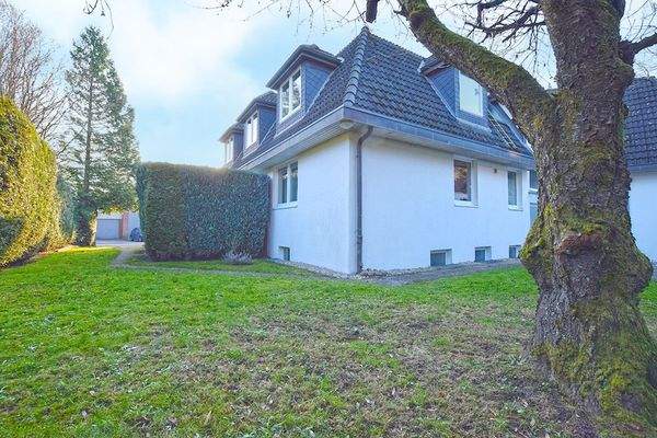 Reduzieren Sie die Terrassenhecke ... und Sie blicken in einen schönen Garten