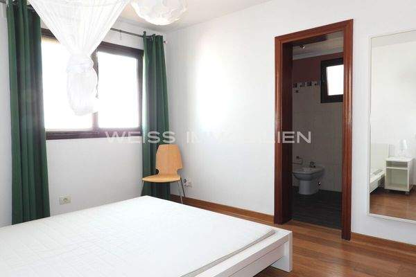 Schlafzimmer mit Bad ensuite