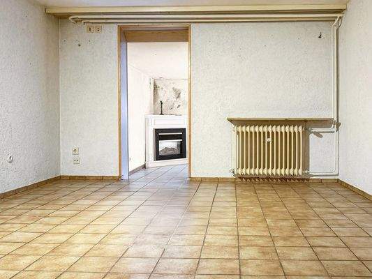 Durchgangszimmer zum Hobbyraum im Kellergeschoss