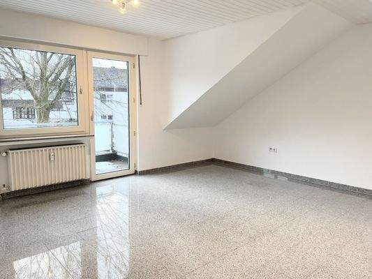 Wohnzimmer mit Süd-Westbalkon