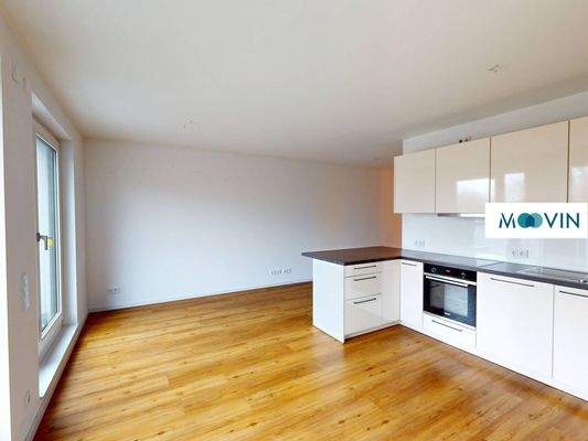 Ansicht IV: Wohn- und Esszimmer mit offenem Küchenbereich