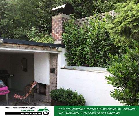 Überdachter Freisitz mit offenen Kamin