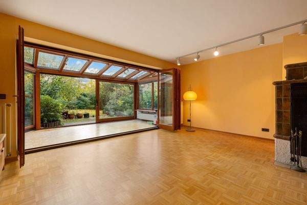 Wohnzimmer mit Wintergarten