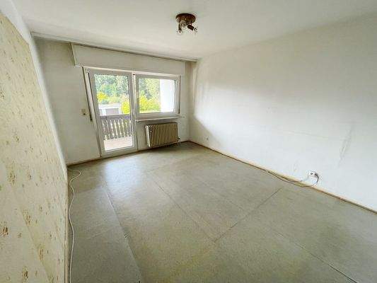 Schlafzimmer mit Balkonzugang