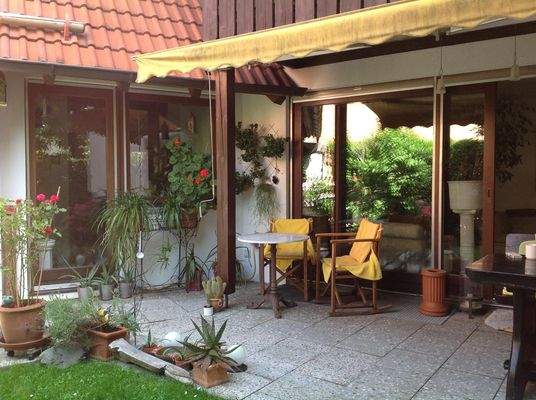 Veranda mit Marquise