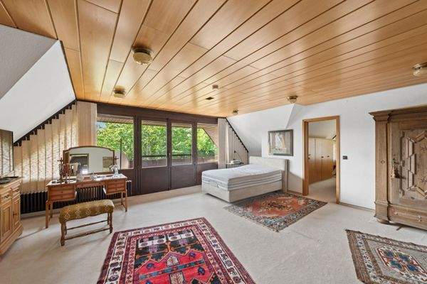 Schlafzimmer mit Balkonzugang