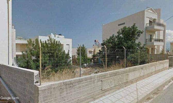 Kreta, Agios Nikolaos: Baugrundstück mit Meerblick im Ort zu verkaufen