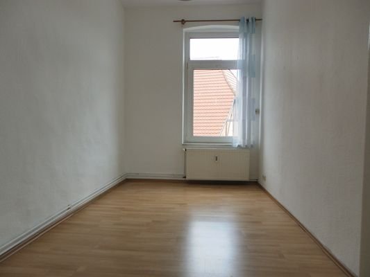Zimmer Obergeschosswohnung (rechts)ks)