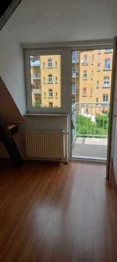 Dachgeschoss-Wohnung mit Balkon