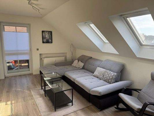 Wohnzimmer mit Balkon