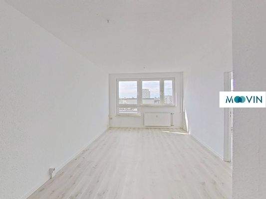 Ansicht II: Wohn- und Esszimmer mit offenem Küchenbereich