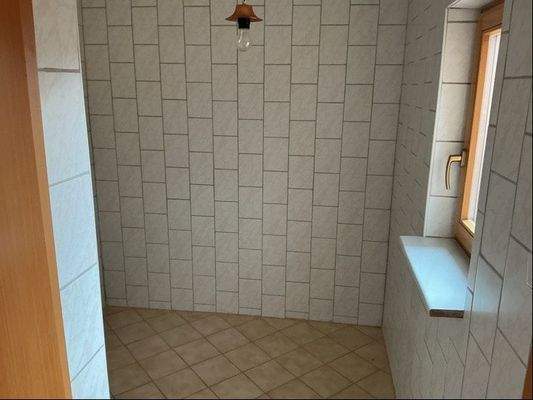 Abstellraum auf halber Treppe