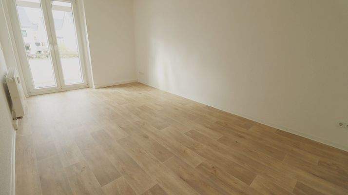 Wohnzimmer mit Zugang Balkon